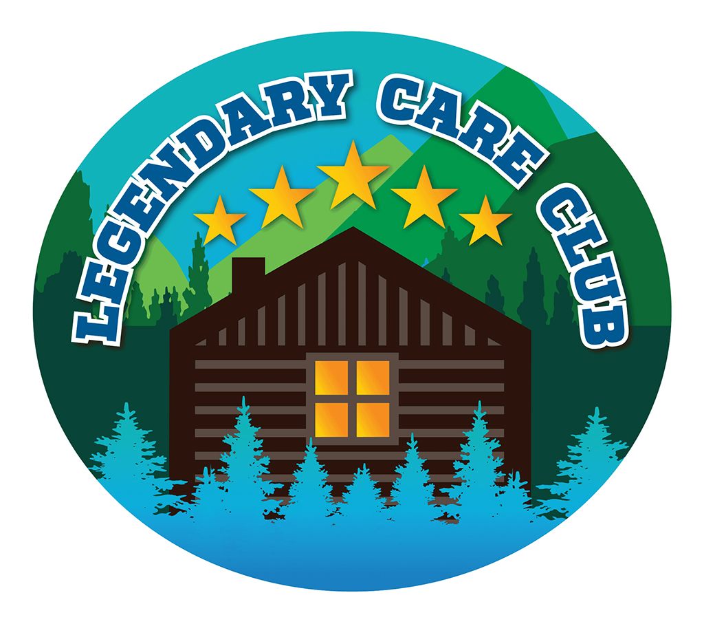 Legendary Care Club circular badge logo featuring dark brown log cabin with illuminated yellow windows, five gold stars arc above cabin, green mountain landscape background, turquoise pine trees in foreground, LEGENDARY CARE CLUB text in bold white letters with navy blue fill arched around top, gradient turquoise to blue background, outdoor mountain lodge aesthetic for HVAC maintenance agreement program branding emphasizing five-star premium service, reliability, and home comfort